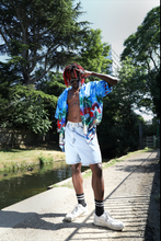 Load image into Gallery viewer, Blue beach scene with parrots Hawaiian shirt
