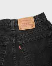 Load image into Gallery viewer, Distressed black Levi's 550 denim shorts