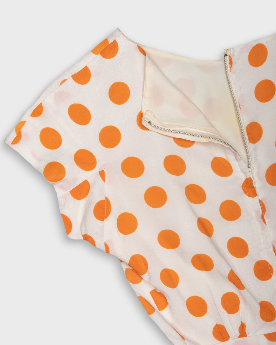 Off white dress with orange polka dot print Off white dress with orange polka dot print