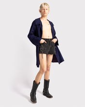 Load image into Gallery viewer, Distressed black Levi's 550 denim shorts