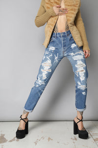 Blue distressed ripped levi's 501's Jeans