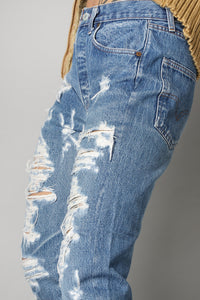 Blue distressed ripped levi's 501's Jeans