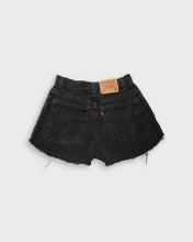 Load image into Gallery viewer, Distressed black Levi&#39;s 550 denim shorts
