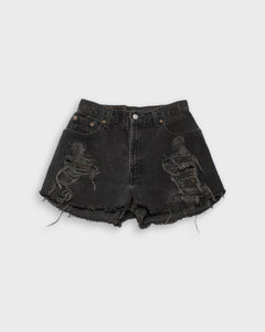 Distressed black Levi's 550 denim shorts