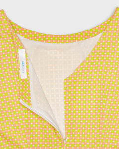 Boat neck dress with a two tone dots pattern