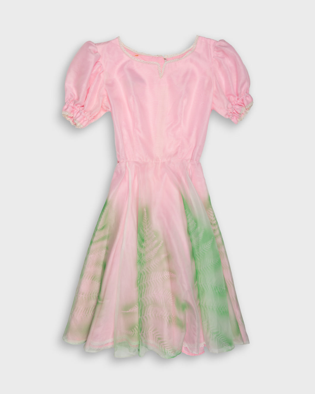 Bubblegum pink fairy dress with leafy stencil patterns