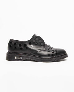 Cult black leather studded slip-on shoes
